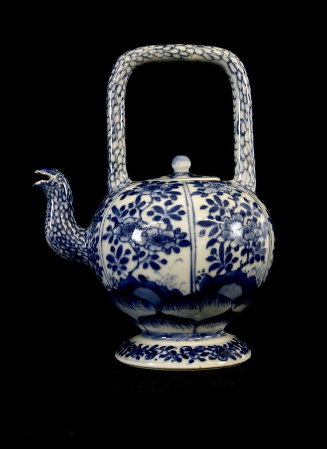 Blue and White Antique Chinese Teapot on Black Background Stock Image