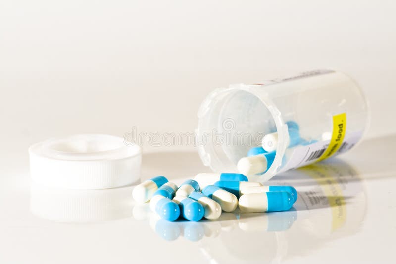Blue and white pills royalty free stock images