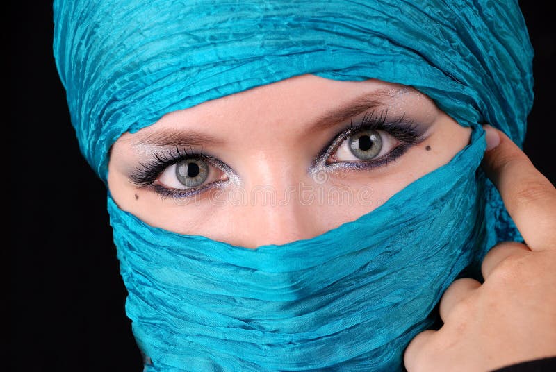 Blue woman s eyes with east make-up