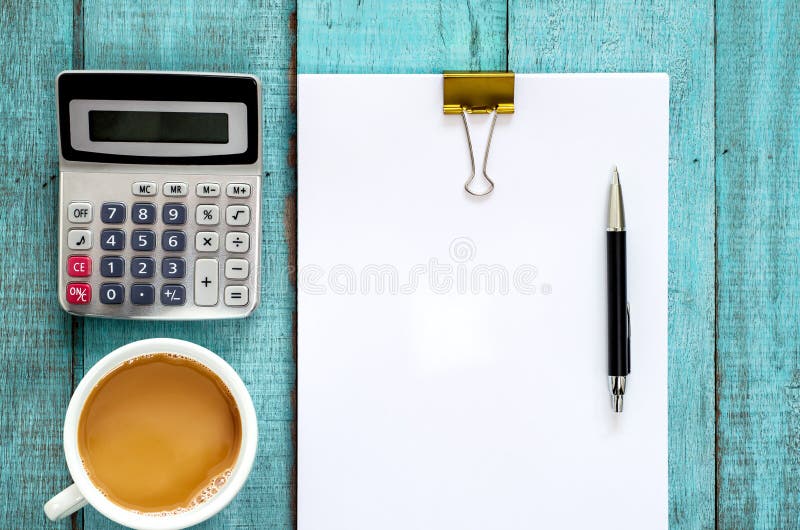 Blue Wooden Desk Table With Paper Ream, Pen, Calculator And Cup