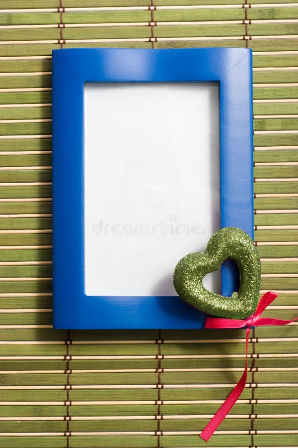 Blue wooden frame with heart