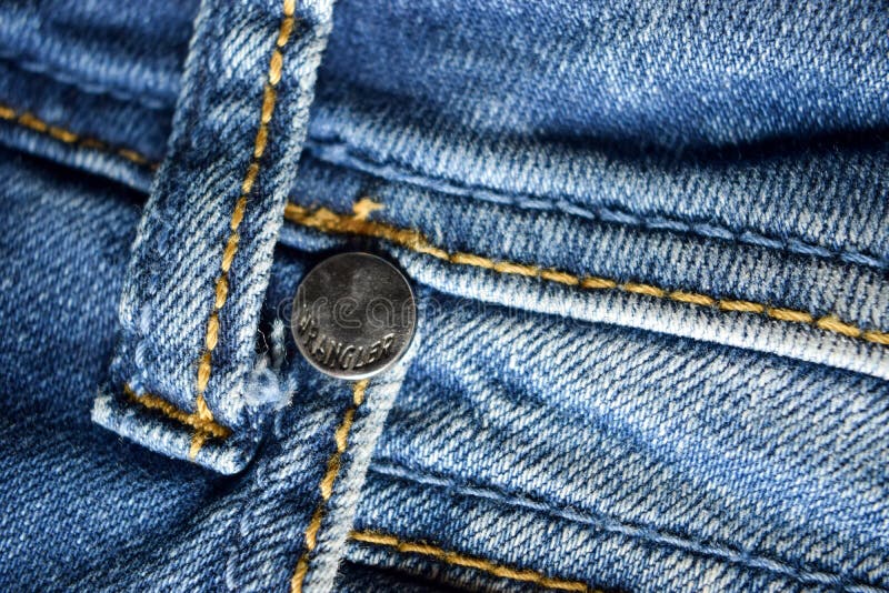 Blue Wrangler Denim Jeans Button Close-up Background Stock Photograph  Editorial Stock Image - Image of leather, editorial: 175215669