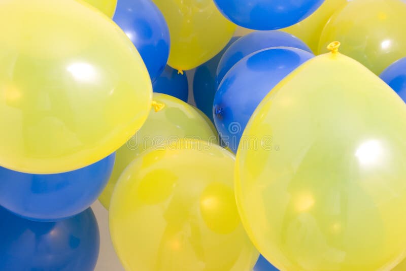 Blue and Yellow Balloons Background stock images