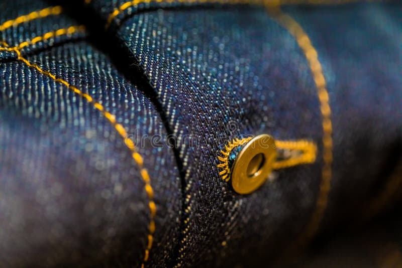 Blue and Yellow Denim with stitching royalty free stock image