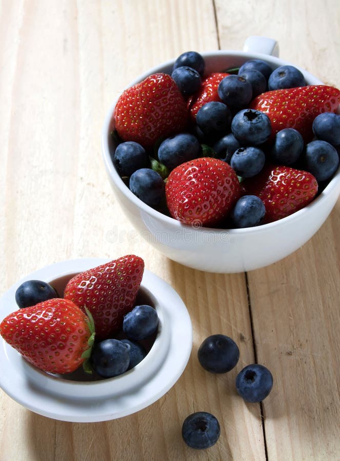 Blueberries or strawberry stock photo. Image of macro 23609980