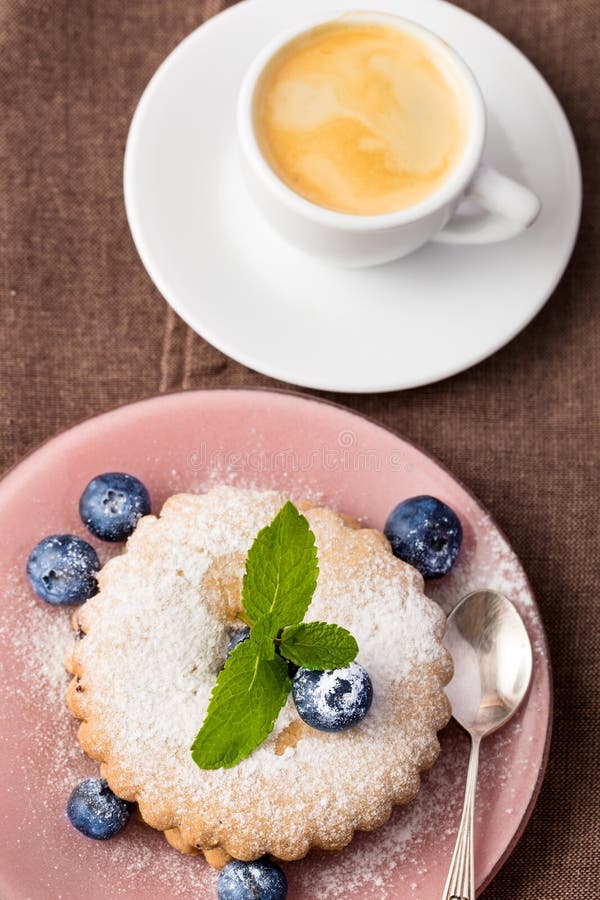 Blueberry Cookie and Coffee Cup Stock Image Image of saucer, spoon