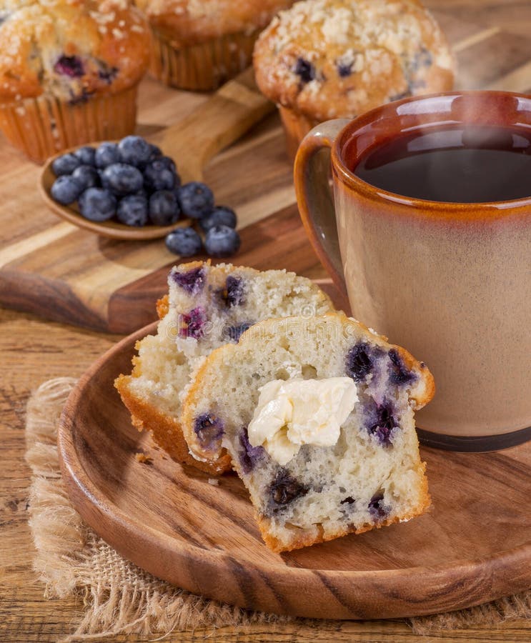 Blueberry Muffin With Butter and Cup of Coffee