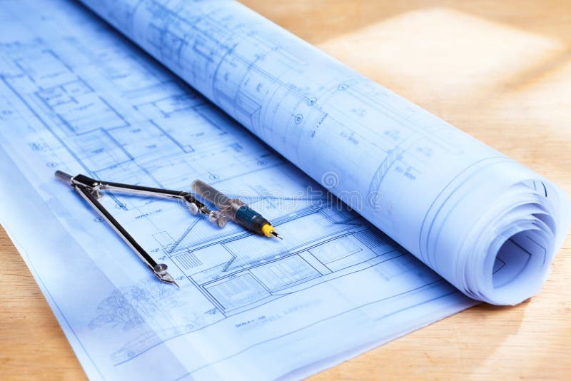 Blueprint on wooden desk stock image. Image of plan, still 20193647
