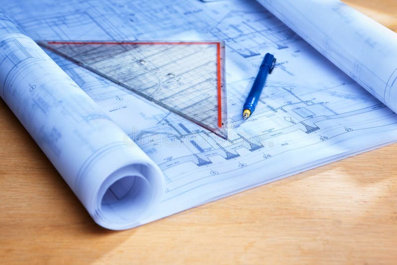Blueprint on wooden desk stock image. Image of plan, still 20193647