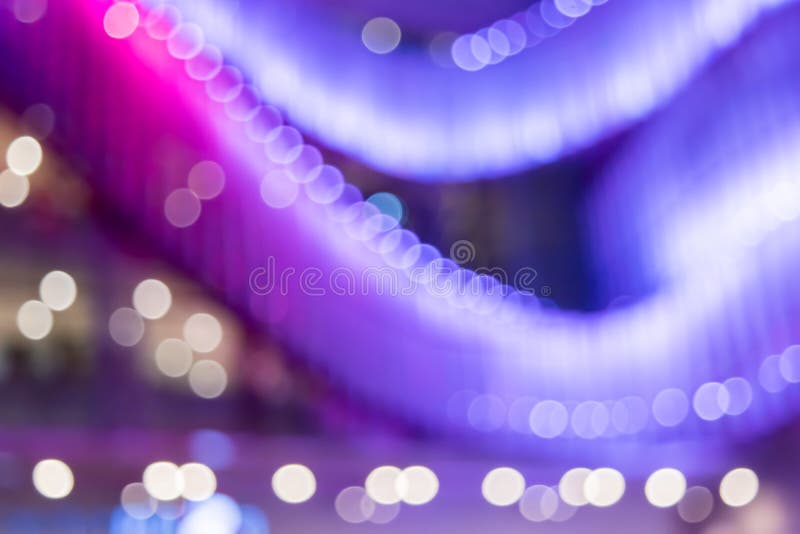 Blur colorful background of display lights in front of the shopping mall.