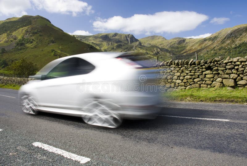 Blurred car on the mountain road, UK