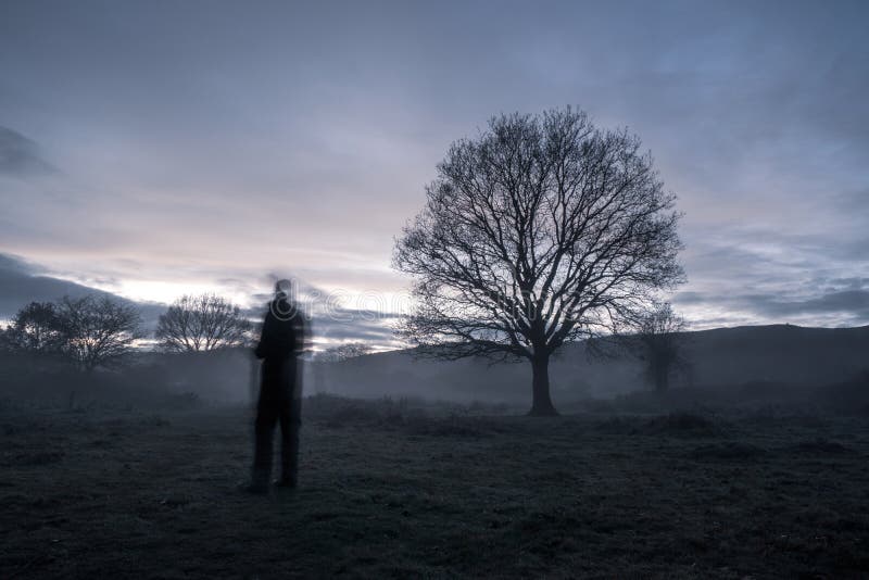 A Blurred Ghostly Figure in the Countryside on a Moody Atmospheric ...