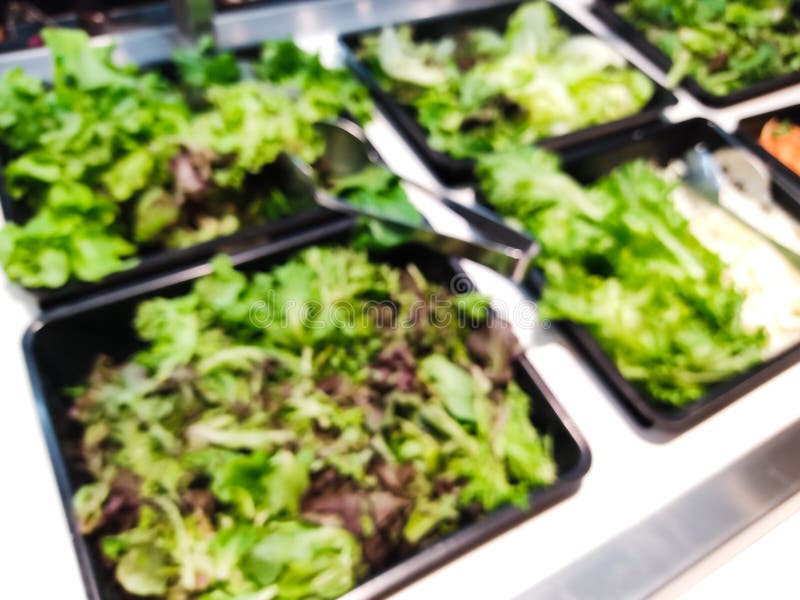 Blurred green salad bar stock image. Image of light 209664277