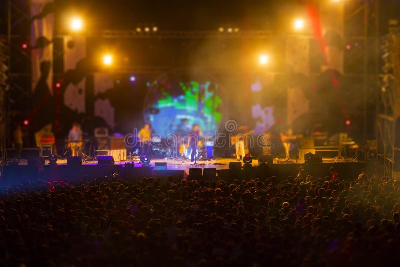 Blurred image of audience in free night music festival no charge admission royalty free stock photos Blurred image of audience in free night music festival no charge admission royalty free stock photos