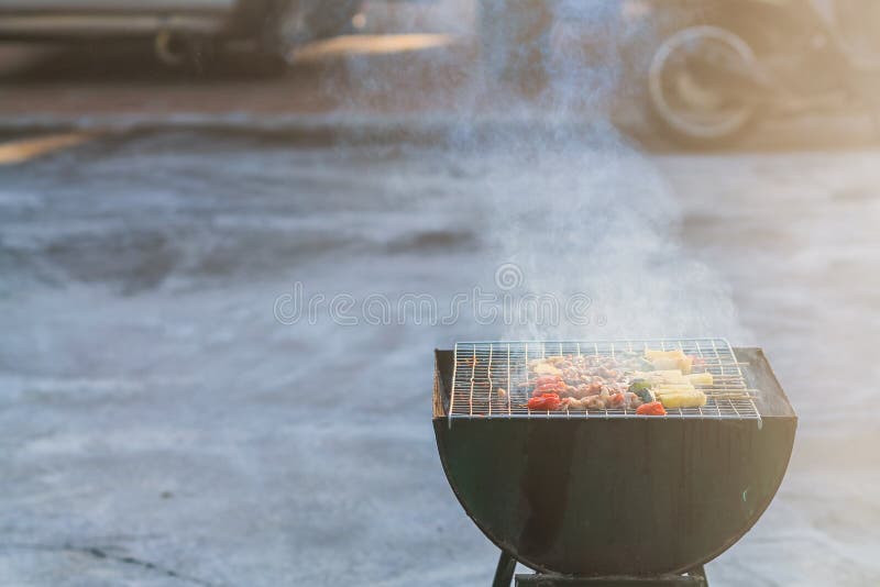 Blurred Image,Barbecue BBQ Skewered on a Charcoal Grill is a Street
