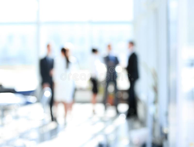 Blurred image of business people standing in office.business background