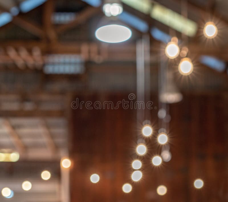 Blurred Image Of Lights Hanging In An Old Barn Stock Image Image