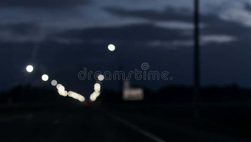 Blurred image of the night road royalty free illustration