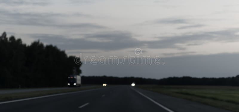 Blurred image of the night road royalty free illustration