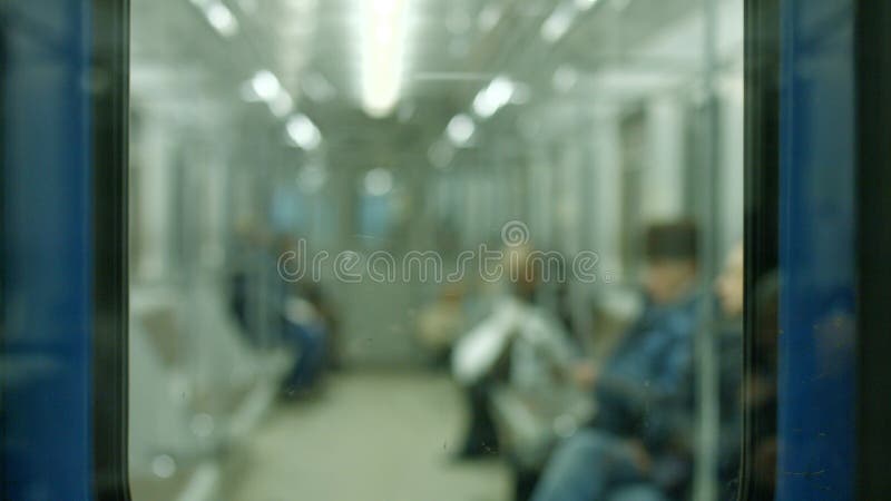 Blurred image of people in subway train. royalty free stock image