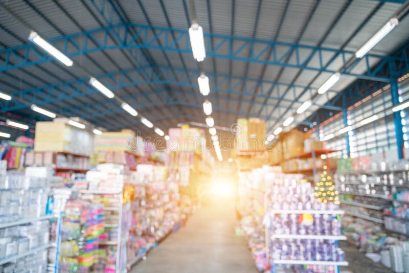 Blurred image Warehouse of a large-scale shopping center. Warehouse and export industry background concept royalty free stock photography