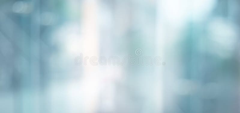 Blurred images of glass wall with city town background.modern abstract window. For banner design