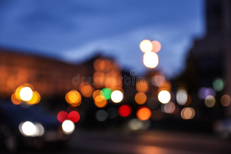 Blurred View of Modern City at Evening. Stock Photo - Image of ...