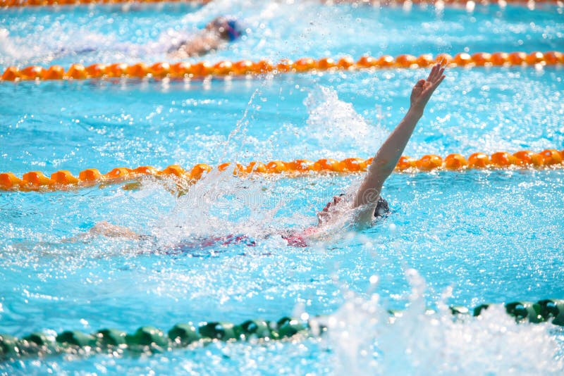 Blurry Background of Splash Drop Water on Swimming Race Editorial Photo