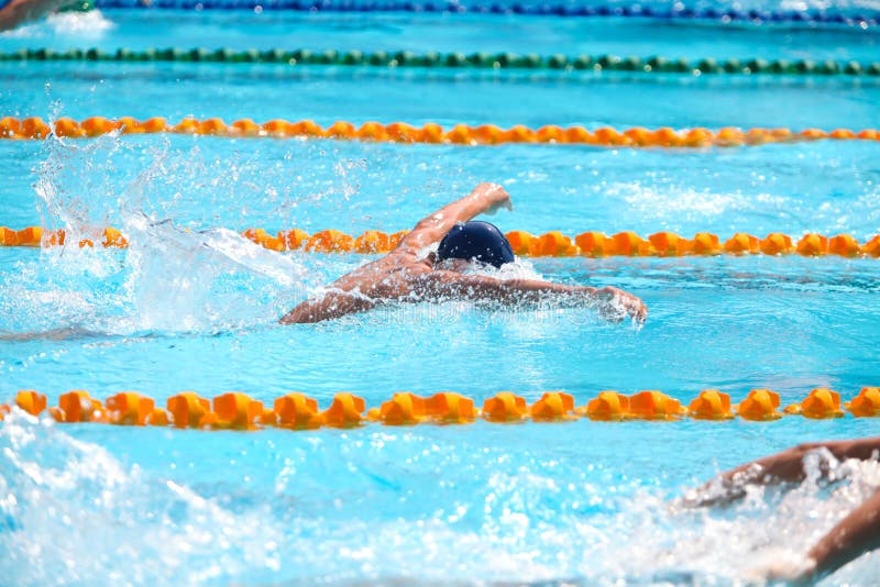 Blurry Background of Splash Drop Water on Swimming Race Editorial Photo