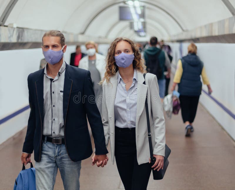 Blurry image of a crowd of people in a subway crossing. stock image