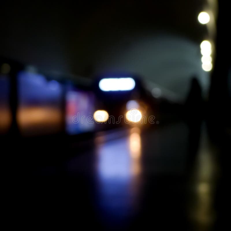 Blurry image of a subway with human silhouette royalty free stock photo