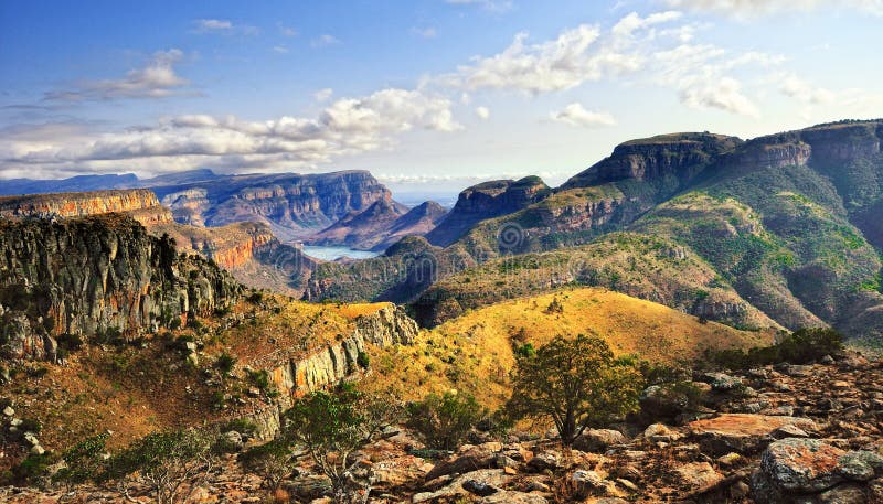 The Blyde River Canyon is a significant natural feature of South Africa. It is approximately 26 kilometers in length and is, on average, around 800m deep. The Blyde River Canyon is a significant natural feature of South Africa. It is approximately 26 kilometers in length and is, on average, around 800m deep.