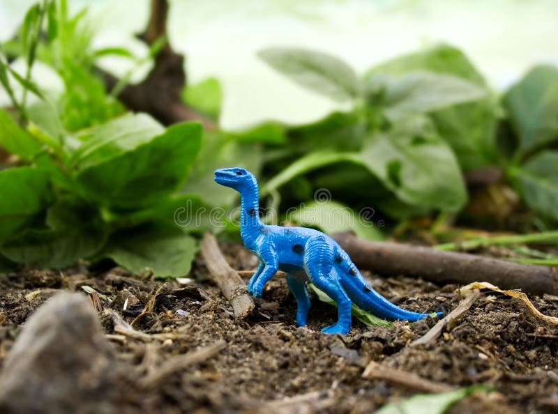 Jungle Blue Dinosaur standing on nature background. Jungle Blue Dinosaur standing on nature background