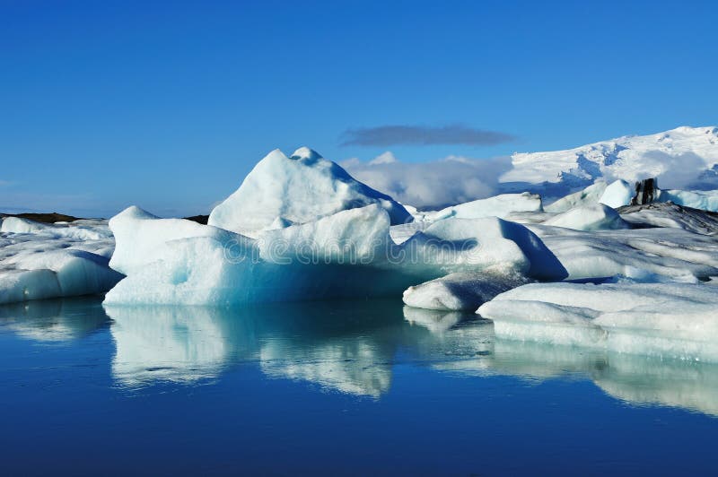 Blue icebergs floating in the jokulsarlon lagoon in Iceland. Blue icebergs floating in the jokulsarlon lagoon in Iceland