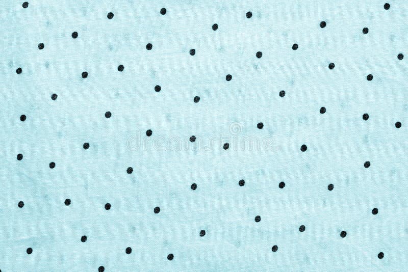 Blått texturerad bakgrund av tyg i ärtor royaltyfria foton Blått texturerad bakgrund av tyg i ärtor royaltyfria foton