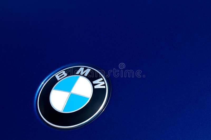 BMW Badge on Blue Car