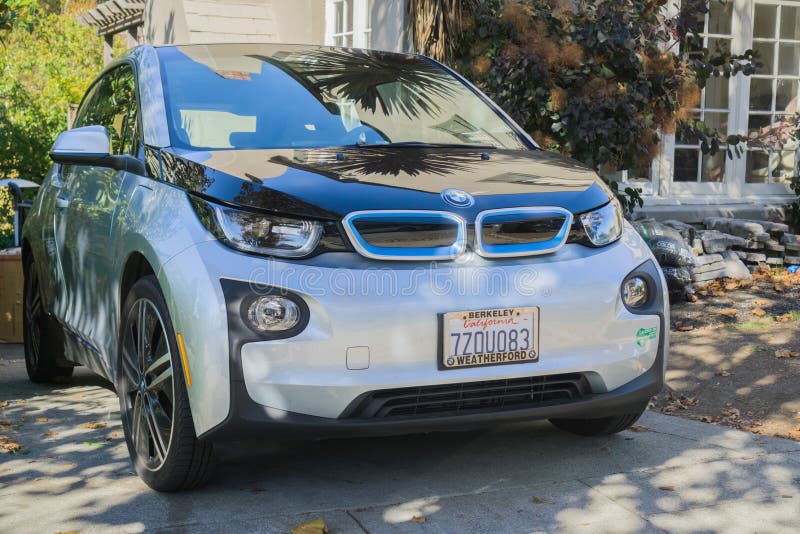 October 22, 2017 Oakland/CA/USA - A BMW electric vehicle, model I3, parked in front of a house in a residential neighborhood, San Francisco bay area