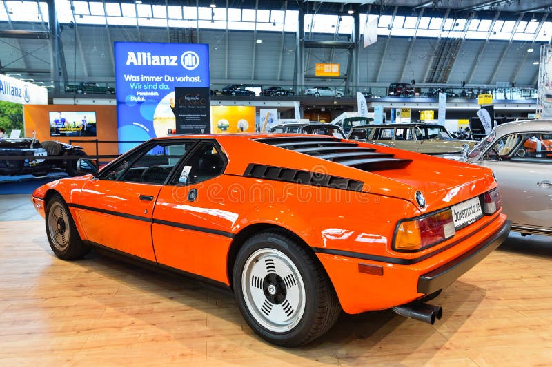 The BMW M1 (model code E26) is a mid-engined sports car produced by German automotive manufacturer BMW from 1978 to 1981. In the late 1970s, Italian automobile manufacturer Lamborghini entered into an agreement with BMW to build a production racing car in sufficient quantity for homologation, but conflicts arose that prompted BMW to produce the car themselves. It is the first mid-engine BMW automobile to be mass-produced the second is the i8 plug-in hybrid sports car. The BMW M1 is the first car to be solely developed by BMW M and employs a 3,453 cc (3. 5 L) M88 1 petrol six-cylinder engine with Kugelfischer-Bosch mechanical fuel injection and Magneti-Marelli ignition system. Code division stock images, royalty-free photos and pictures