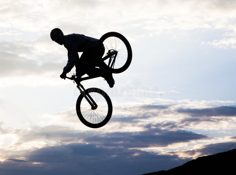 Silhouette Of A Man Doing A Jump With A Bmx Bike Stock Image Image of