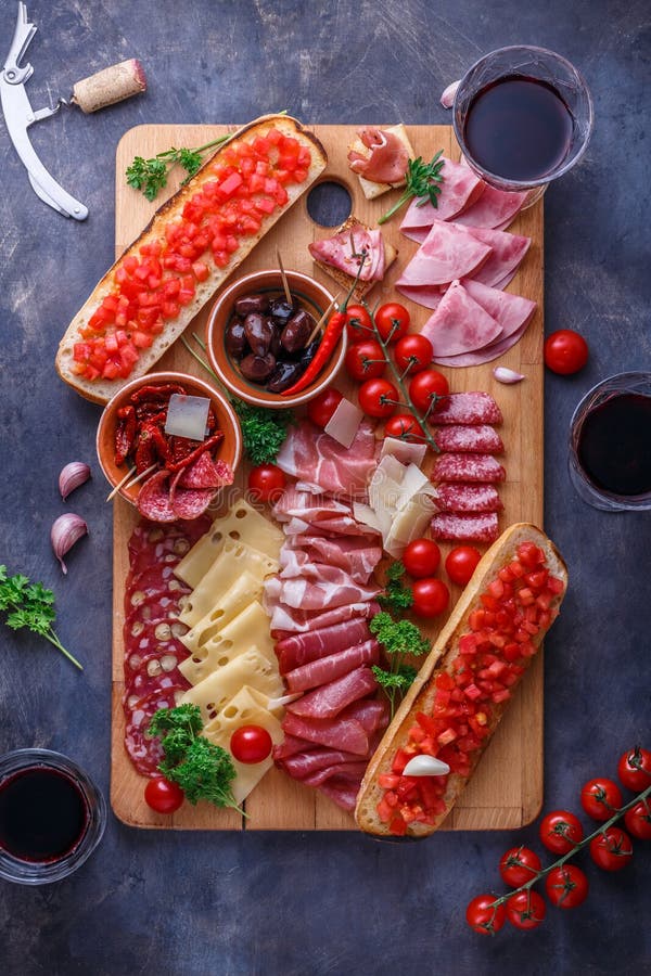 Board of Cured Meat, Cheese and Bread with Wine, Copyspace Stock Image