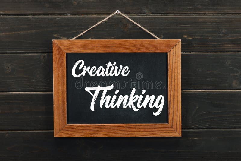 Board with lettering creative thinking hanging stock images