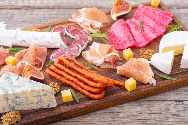 Board with Meat, Sausages and Cheese Stock Photo Image of prosciutto