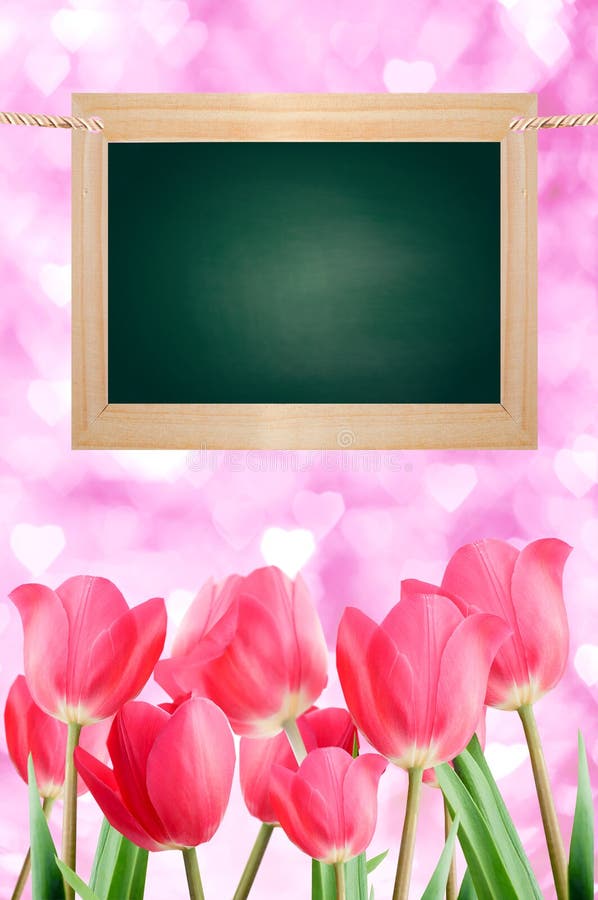 Board and a bouquet of tulips on a pink background of heart. Board and a bouquet of tulips on a pink background of heart.