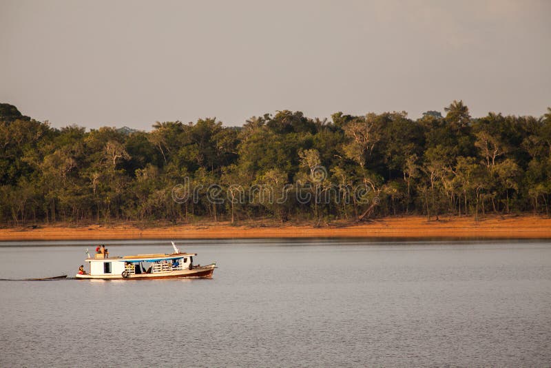 Boat on Amazon river stock photo. Image of rainforest 93456556