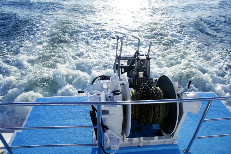 Boat Anchor Winch Pulley And Rope. Prop Wash Foam Stock Photography