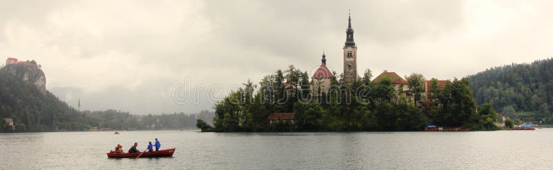 Boat on Bled lake stock image Boat on Bled lake stock image