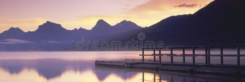 Boat dock at Lake McDonald stock photo Boat dock at Lake McDonald stock photo