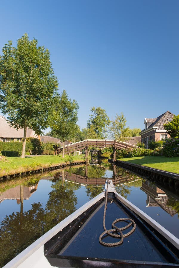 With boat in Dutch village stock photo. Image of holland - 49970090