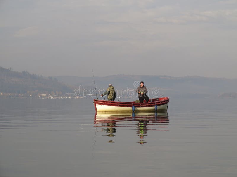 Boat fishing on lake