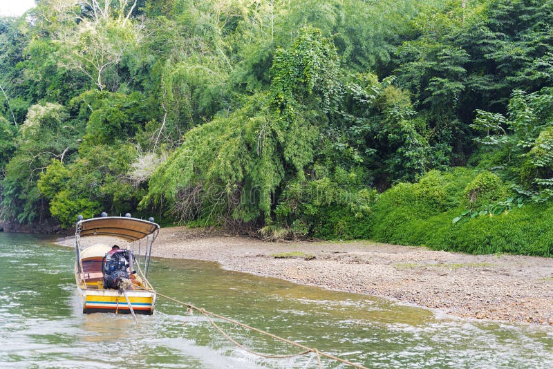 Boat floats on the river. stock image. Image of branches 84432071